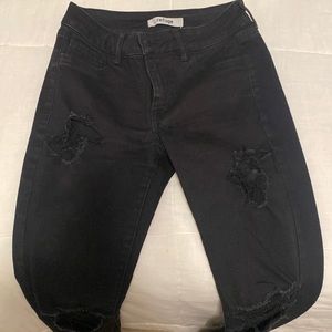 Black distressed skinny jeans
